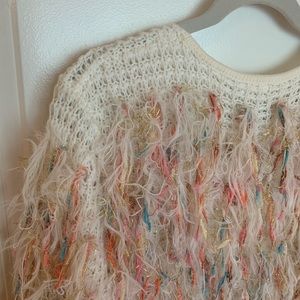 Fun rainbow sweater, perfect with jeans and a white tee!